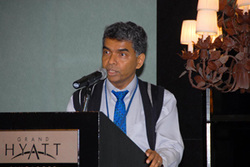 Tilak Abeysinghe at an economics forum 2 years ago